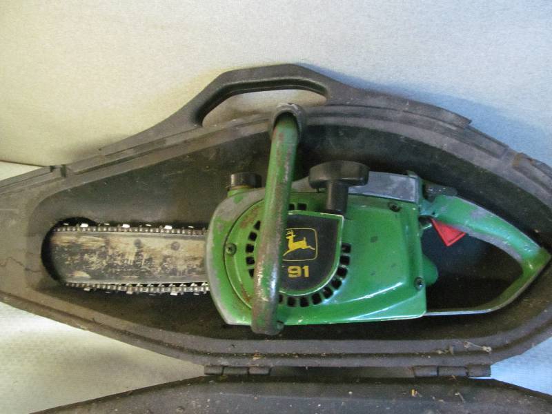 lot 201 image: John Deere chainsaw