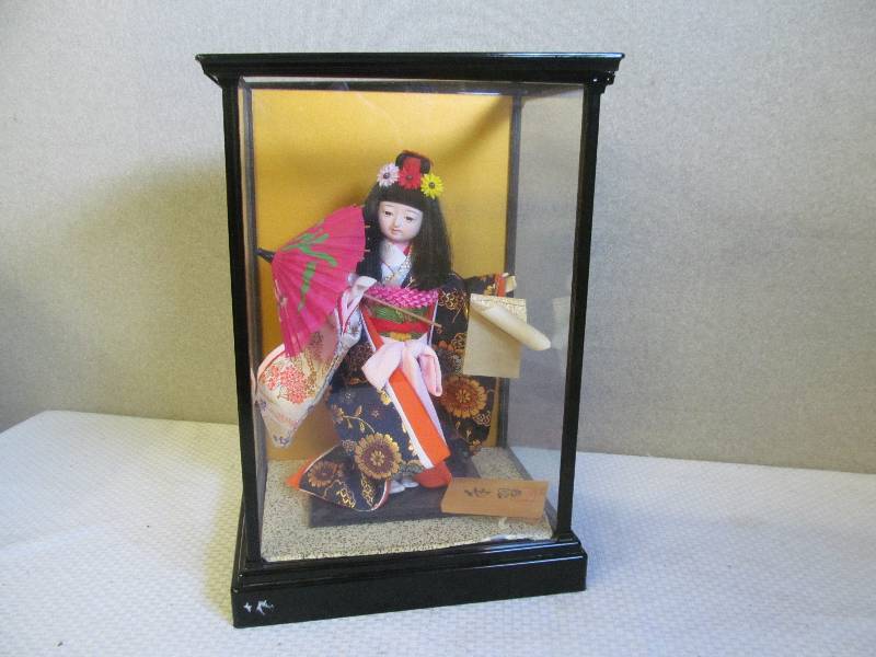 lot 214 image: doll