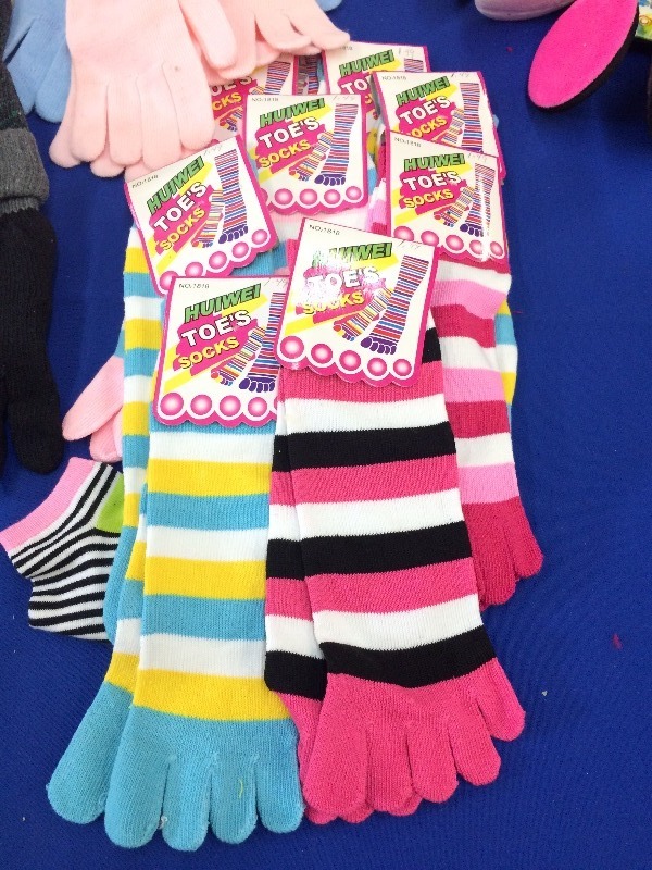 Assorted lot of slippers, socks, gloves, hats, ear muffs,   New Product - view all pictures