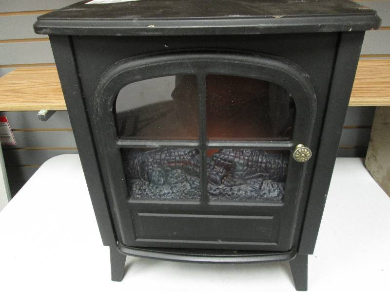lot 182 image: Small electric fireplace - needs ne...