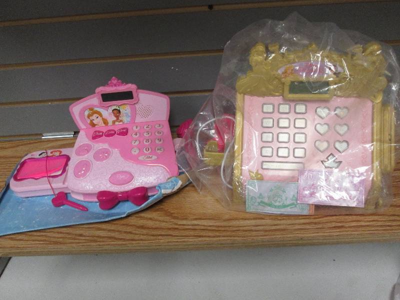 lot 187 image: 2 styles Princess toy cash register...