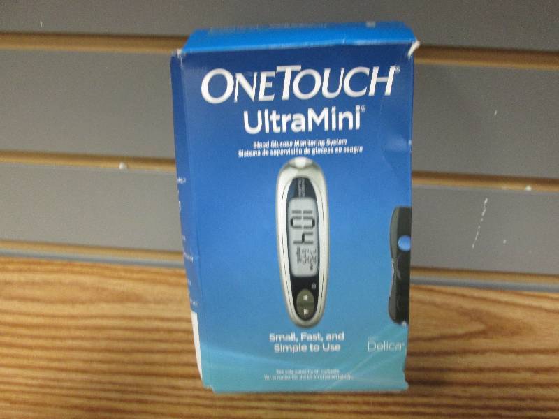 lot 203 image: OneTouch UltraMini glucose monitori...