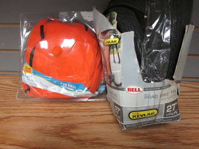 lot 266 image: Bell 27 bike tire, Orange fun ball...