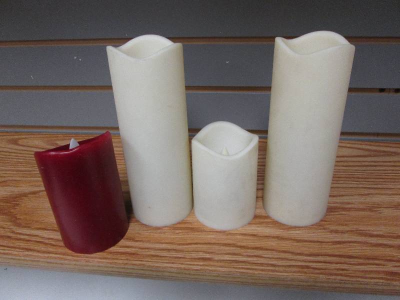 lot 277 image: Lot of 4 battery operated candles...