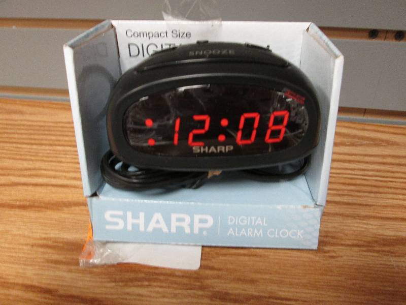 lot 293 image: Sharp digital alarm clock...