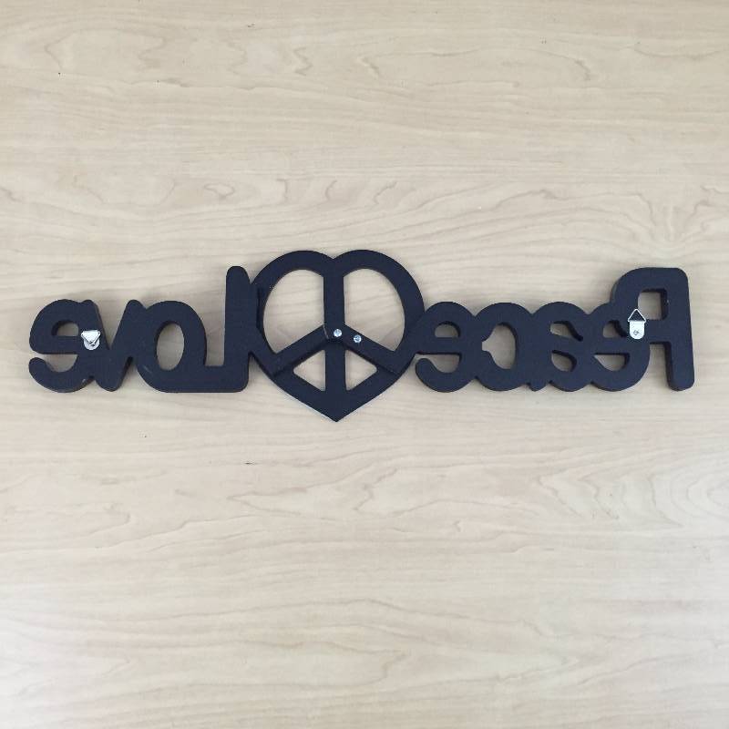lot 84 image: Super Retro Cool 1960s Metal Studded Peace & Love Wall Art