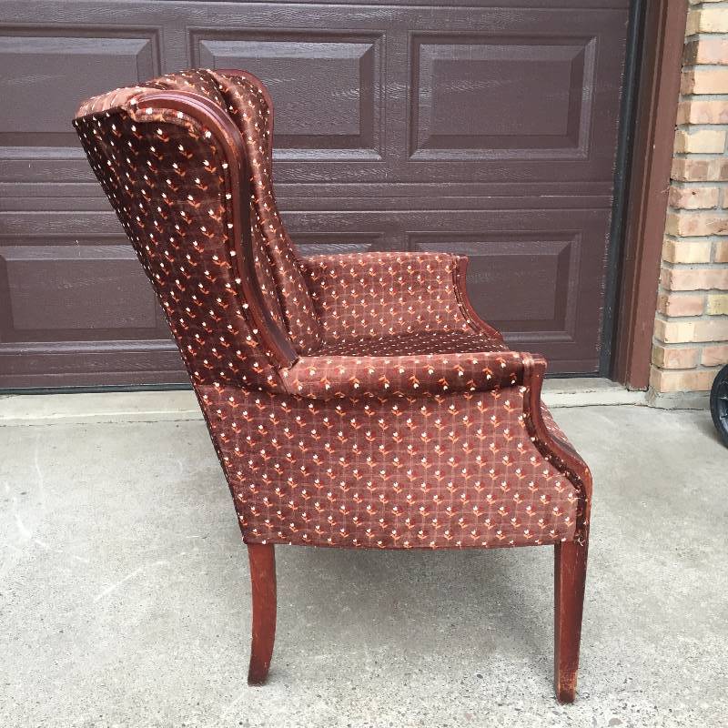 lot 124 image: Luxurious Executive Brushed Brown Fabric Tuck & Roll Wingback Chair 27x30x35.5 - Fabric is Excellent  Wear on mostly front of wood legs