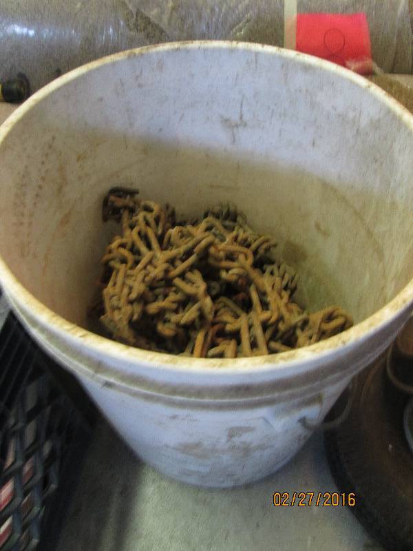 lot 3 image: 5 gallon bucket with metal chain...