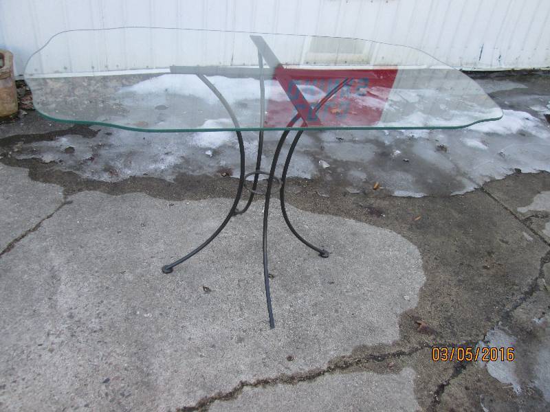 lot 67 image: Small glass top table, bumpers are ...