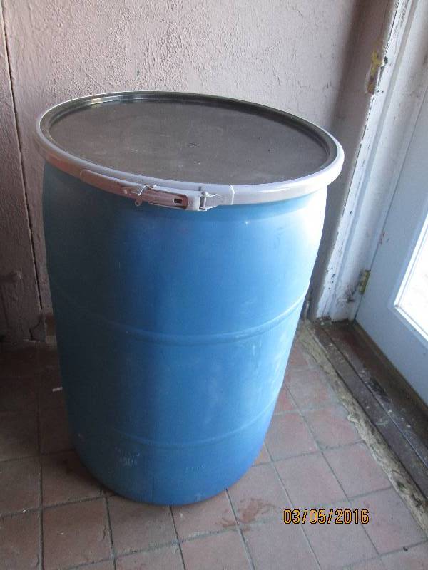 lot 69 image: 55 gallon plastic barrel with latch...
