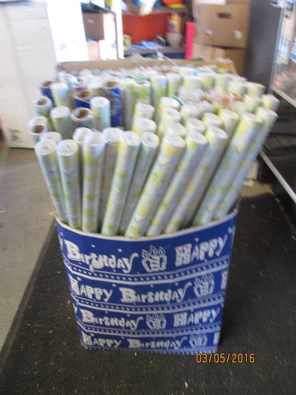 lot 87 image: Large lot of wraping paper in displ...