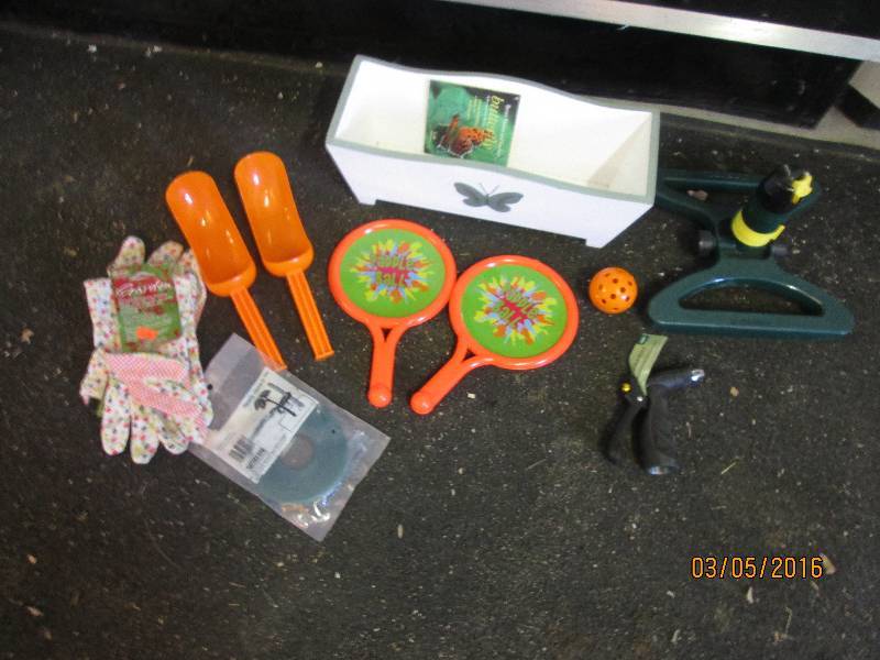 lot 92 image: Gardening supplies and paddle ball ...
