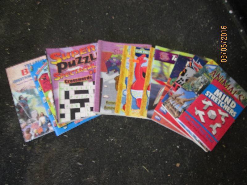 lot 94 image: Puzzle and coloring books...