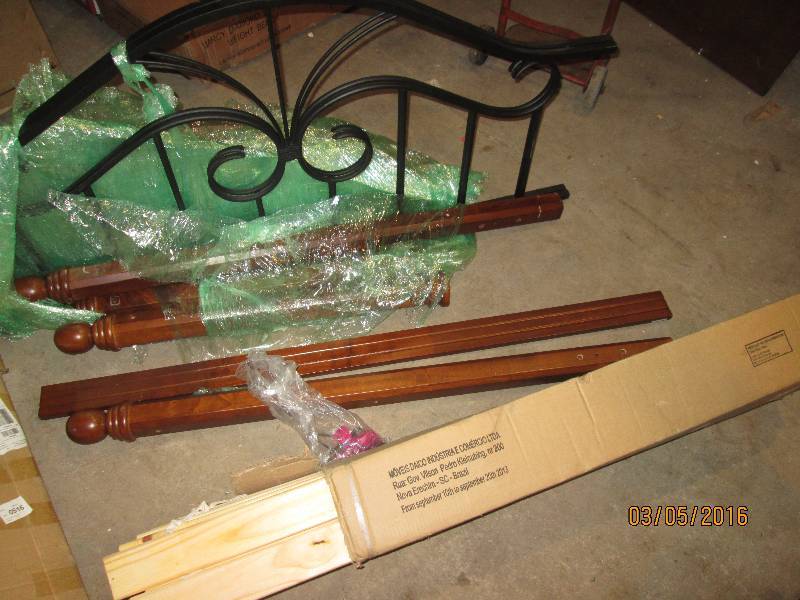 lot 109 image: Metal head and foot board with wood...