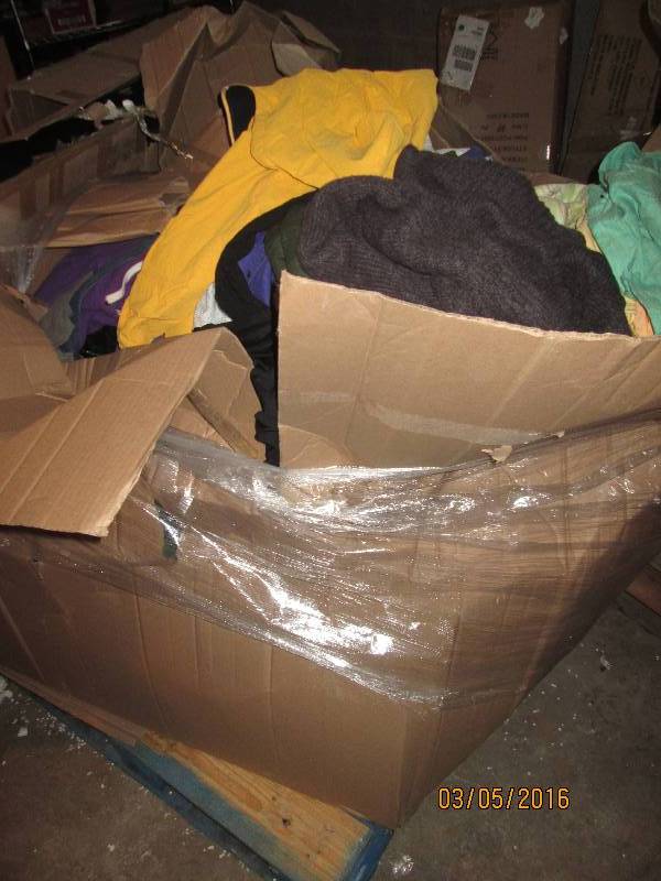 lot 115 image: 4 x 4 foot pallet stacked with clot...