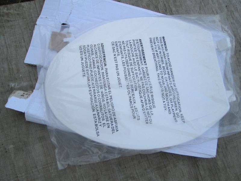 lot 127 image: New toilet seat cover...