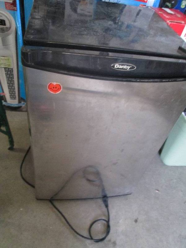 lot 157 image: Black mini fridge, Danby brand.  In...