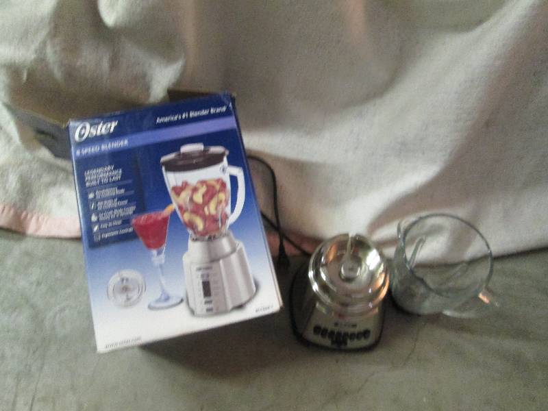 lot 165 image: Oster 8 speed blender.  Very clean,...