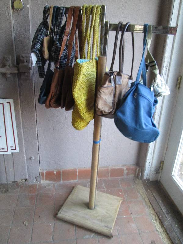 lot 178 image: Purse display rack with purses, jus...
