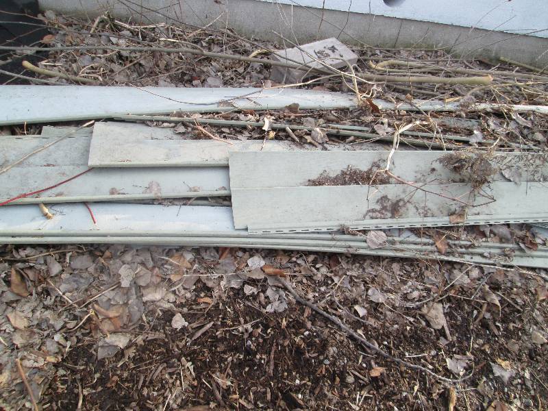 lot 180 image: Lot of vinyl siding, enough to side...