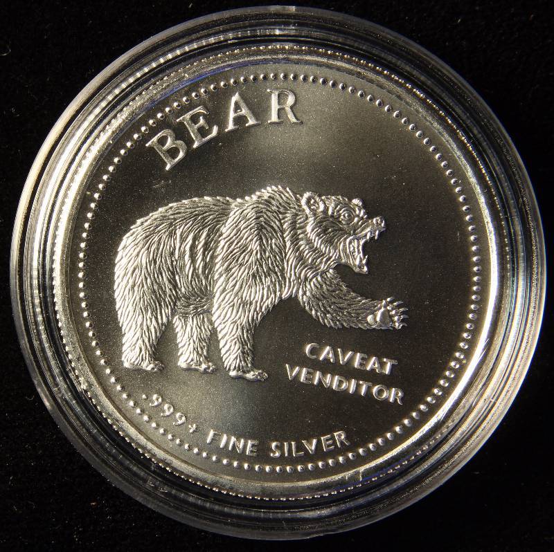 1 TROY OZ. .999 FINE SILVER BULLS & BEARS IN AIRTITE HOLDER