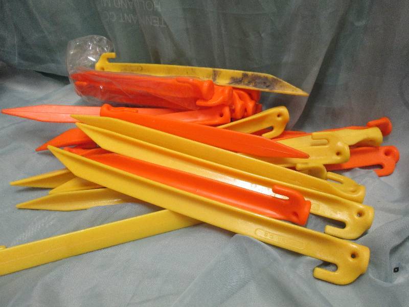 27 plastic tent stakes...