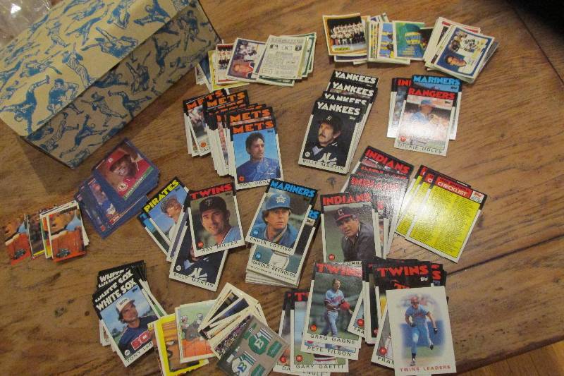 Vintage box of sports cards and sti...