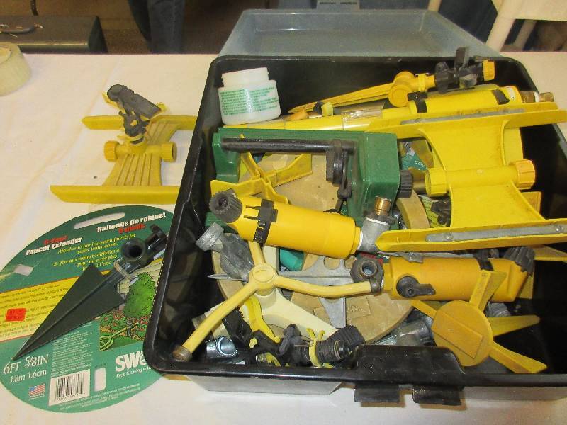 lot 12 image: Yard Sprinklers Parts and Pieces