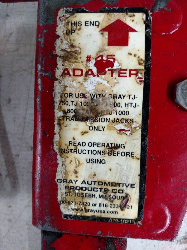 lot 56 image: (4) Gray Tranny Jack Adapters...