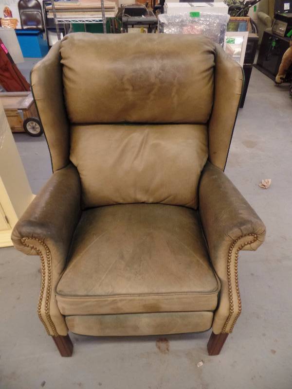 lot 55 image: Leather Recliner in Dark Green and Tan