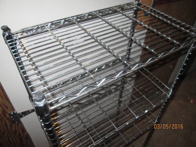 lot 27 image: Metal storage shelf on wheels, 13 x...