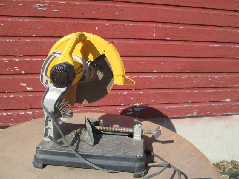 lot 14 image: Dewalt DW81 14 chop saw...