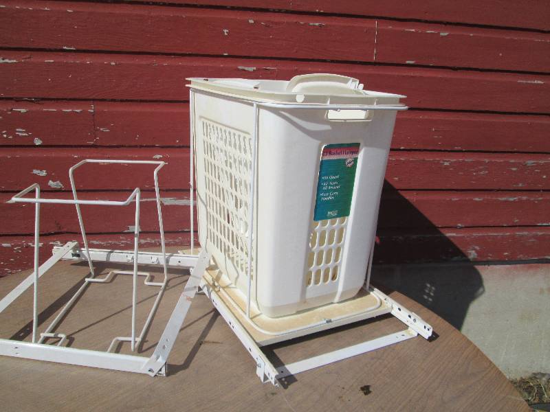 lot 16 image: laundry hamper on sliding base...