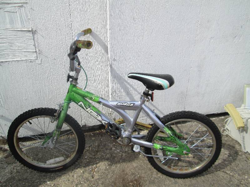 lot 34 image: next serge kids bike...