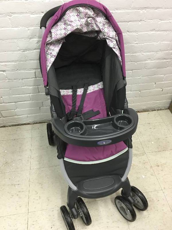 lot 292 image: Graco FastAction Fold Click Connect Travel System retail $199