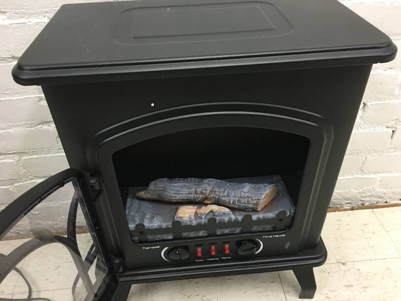 lot 32 image: Randall Electric Wood Heater Retail $150