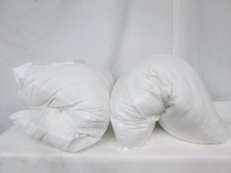 lot 54 image: Rolled Standard Pillows