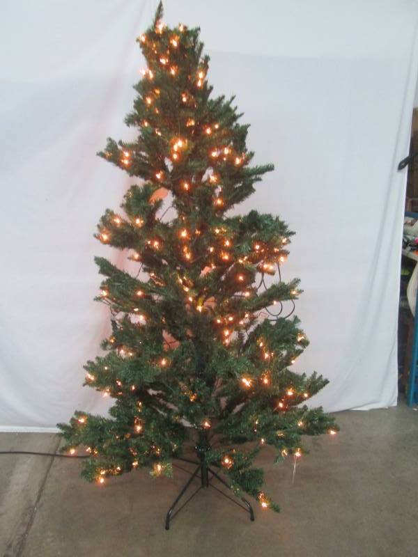 lot 59 image: 7 Prelit Pine Tree with Multicolor Lights