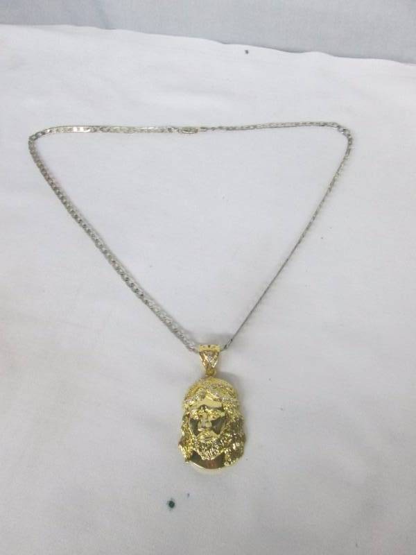 lot 97 image: Goldtone CZ Mens Jesus Pendant