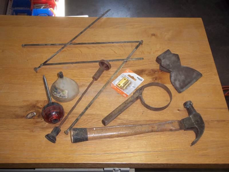 lot 61 image: Assorted tools (hammer, oil filter wrench, screw driver, ax head)