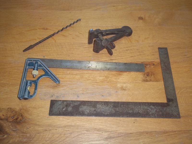 lot 64 image: assorted tools (vintage clamp, squares, drill bit)