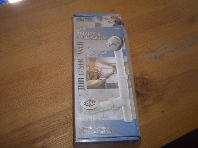 lot 65 image: Bathtub drain kit, chrome plated finish trim pvc trip lever
