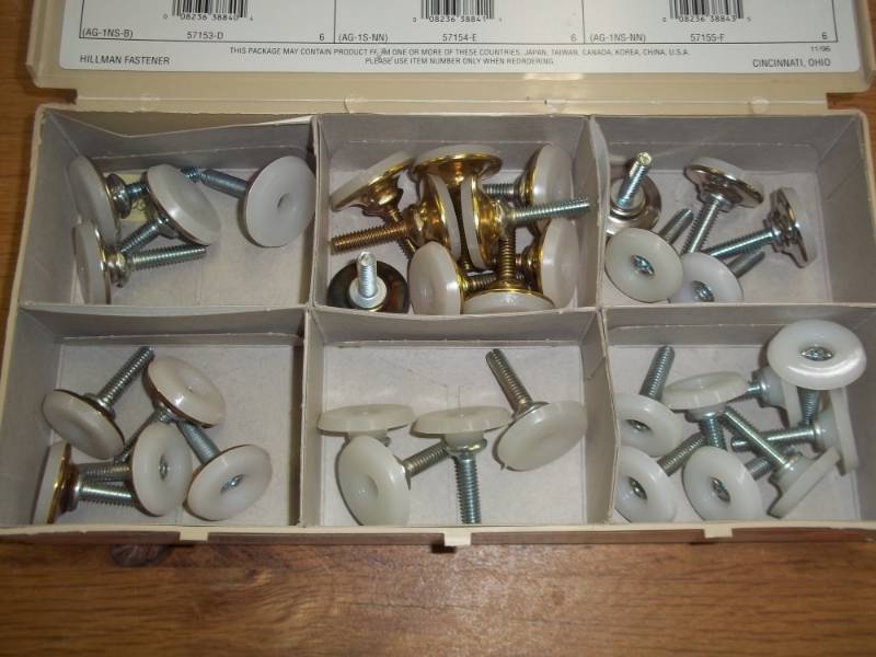 lot 85 image: assorted box of steel nylon glides