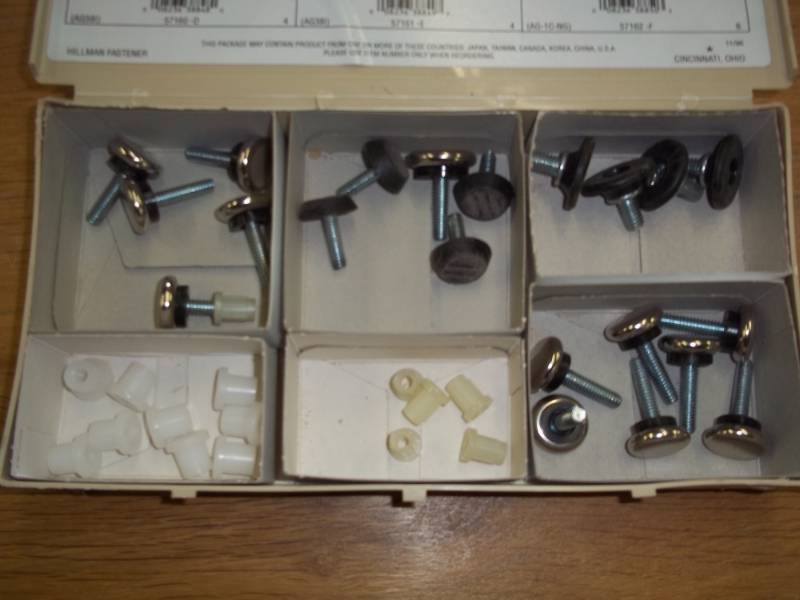 lot 86 image: assorted box of steel nylon glides