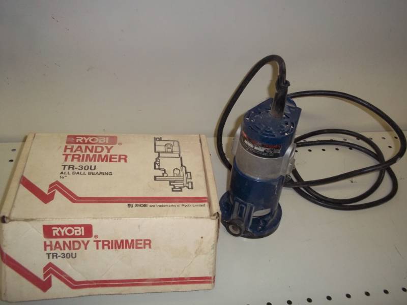 lot 112 image: Ryobi Handy Trimmer corded router plastic guide has crack
