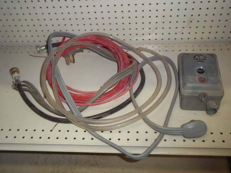 lot 140 image: assorted hose and electrical cords and electric startstop box