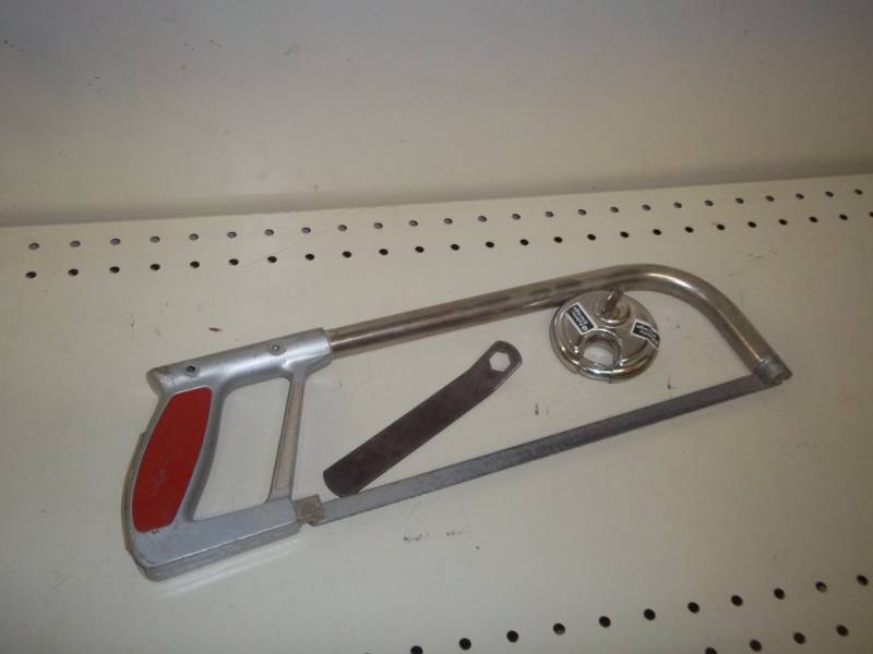 lot 152 image: hack saw, lock, tool wrench