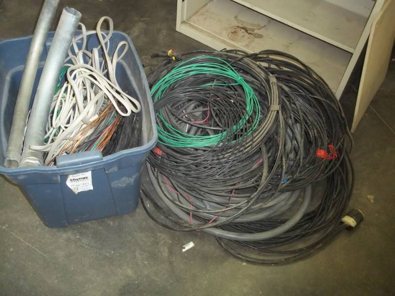 lot 186 image: Large lot of assorted of wire, cord, metal conduitinclude blue tote with wire also