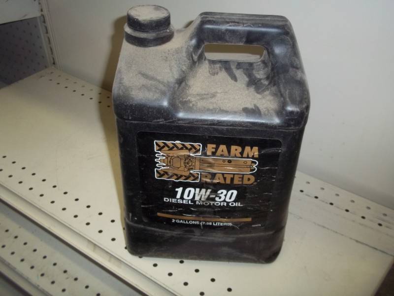 lot 201 image: 2 gal of 10w-30 diesel motor oil almost full