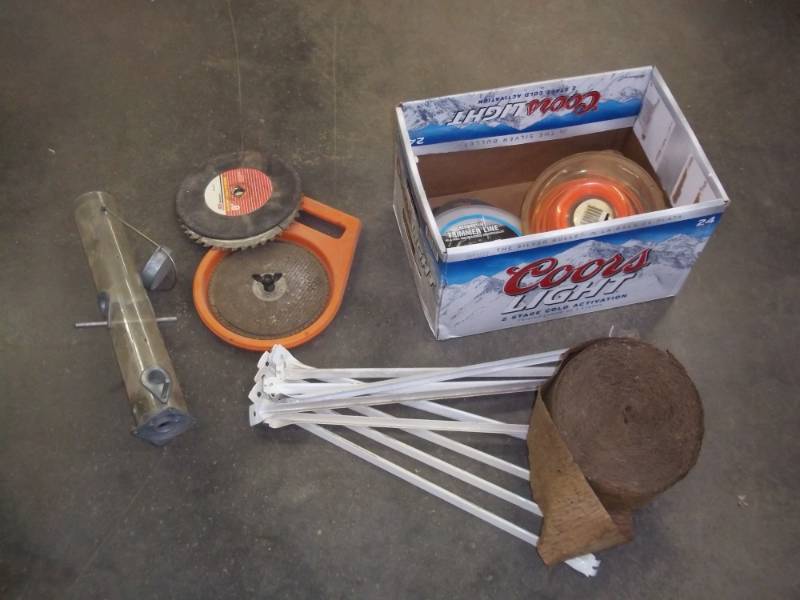lot 249 image: Box with New string trimmer line, shelf brackets, saw blades with case and ext.